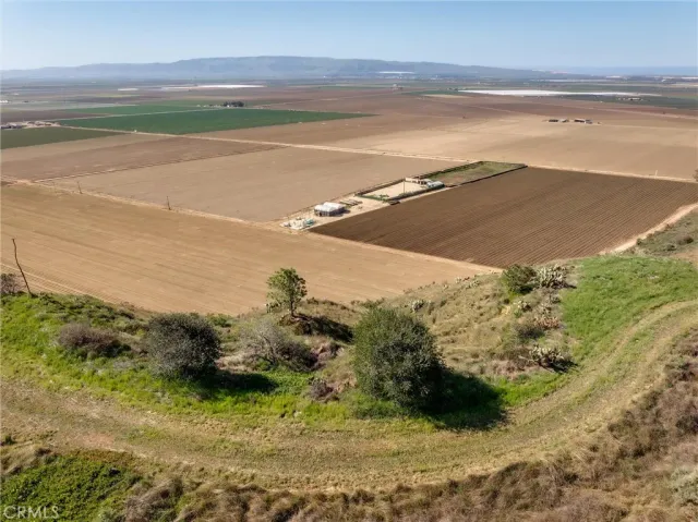 a view of a yard with an ocean