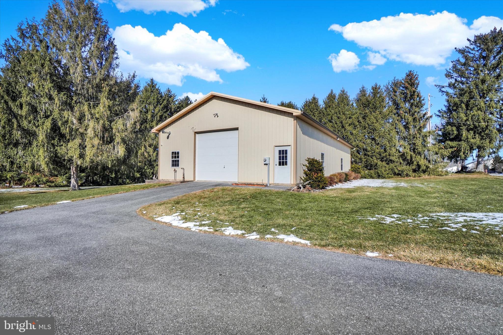 1100 Millcreek Road York, PA 17404 - Photo 33 of 44 a view of a white house with a yard and large tree