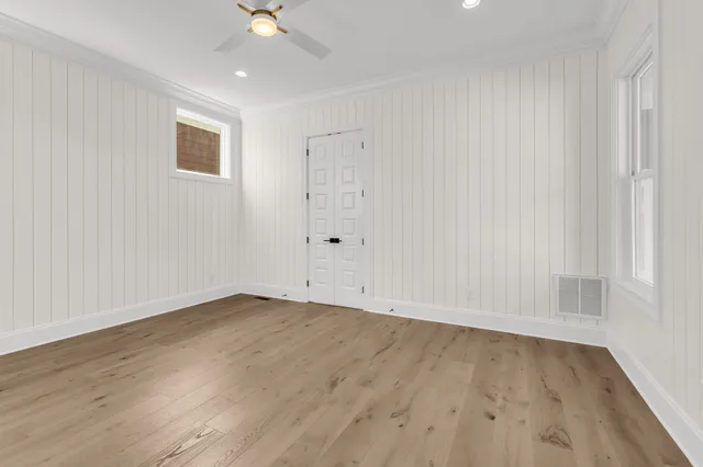 a bathroom with a sink vanity granite tub and shower