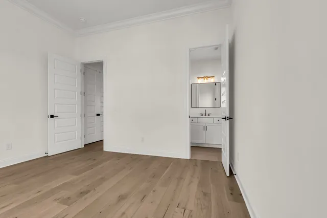 a view of a balcony with wooden floor
