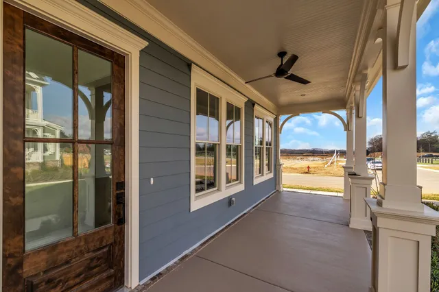 a view of an entryway with a floor to ceiling window