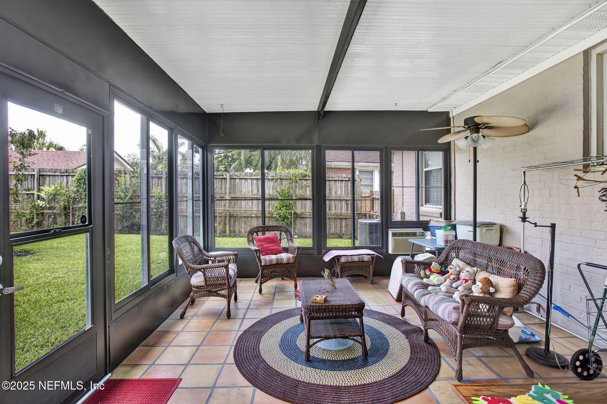 1105 South Shores Road Jacksonville, FL 32207 - Photo 18 of 31 a living room with furniture and a large window