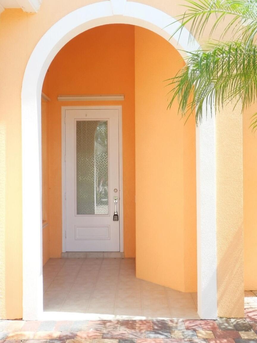 11547 Southwest Rockingham Drive Port St. Lucie, FL 34987 - Photo 3 of 45 Front Covered Entrance grok