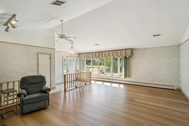 a room with furniture and a window