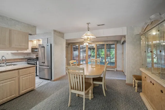 a bedroom with bed and a window