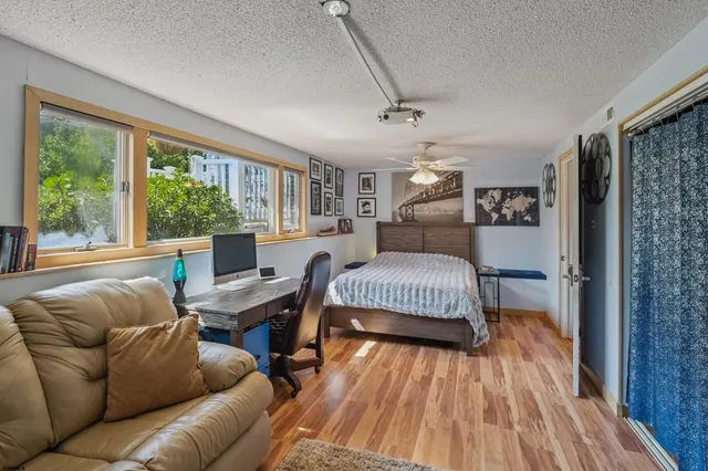 a room with furniture and a window