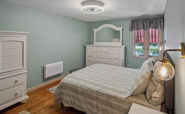 a view of an empty room with windows