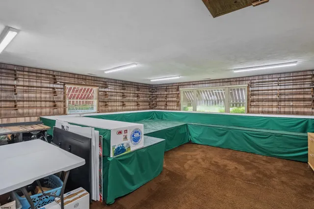 a bathroom with a sink toilet and mirror