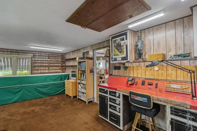 a bathroom with a double vanity sink a toilet and a mirror