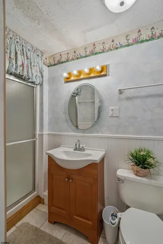 a view of a livingroom with chairs