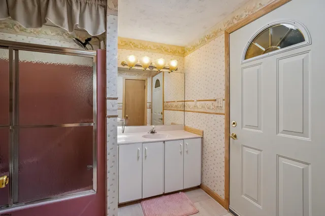 a front view of house with yard and seating area