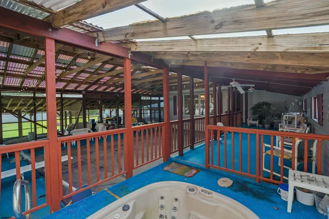 an aerial view of multiple houses with yard