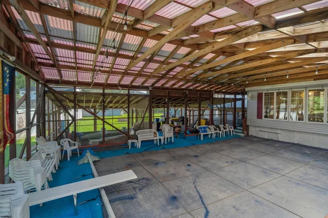 an aerial view of a house with a garden