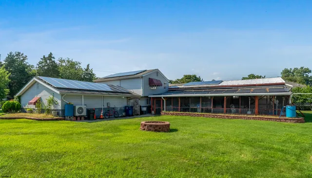 an aerial view of a house with a garden