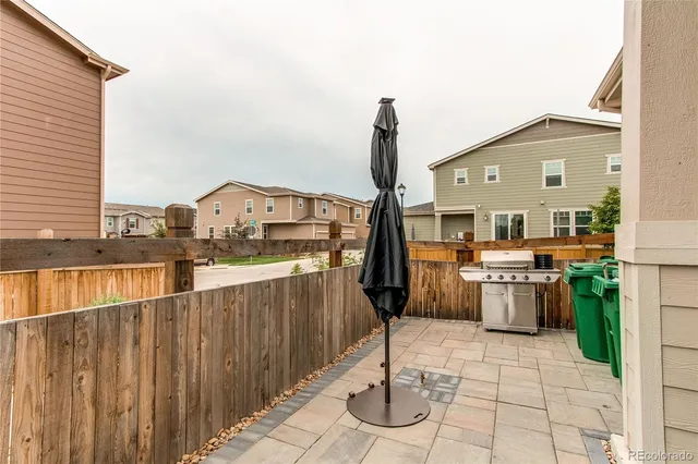 a view of a balcony with chairs