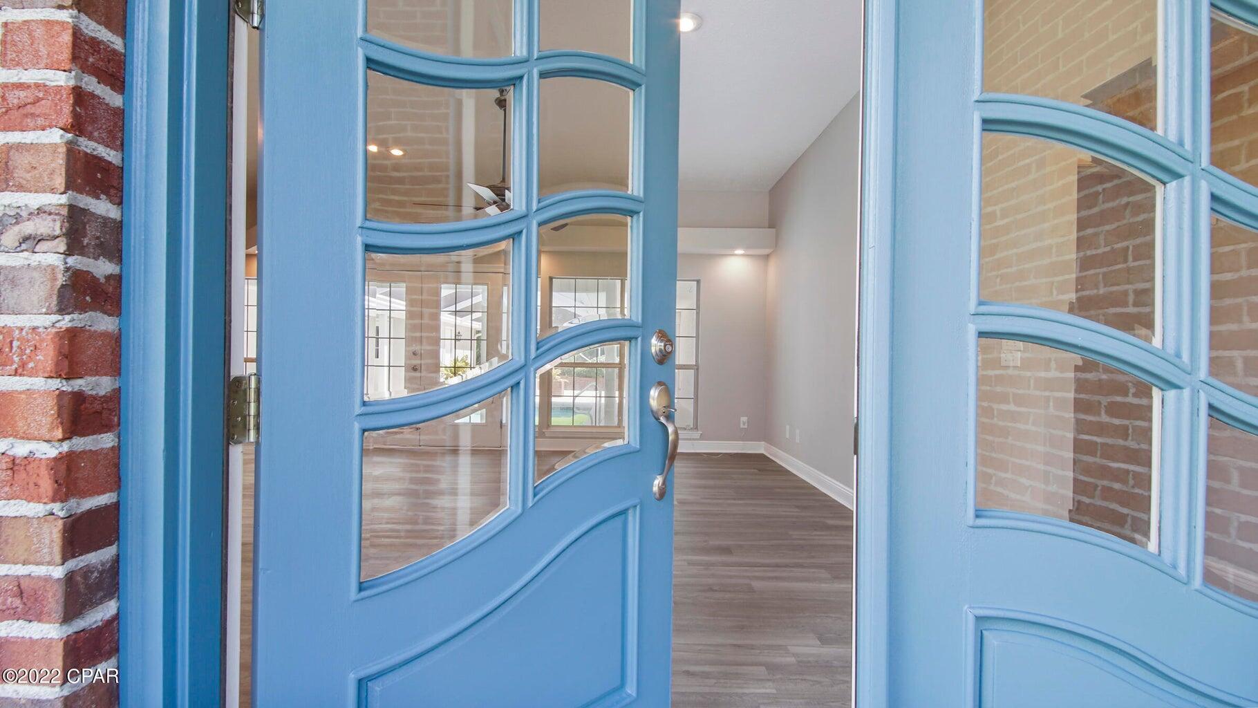 104 Colony Harbour Road Panama City Beach, FL 32407 - Photo 16 of 75 a view of staircase with large window