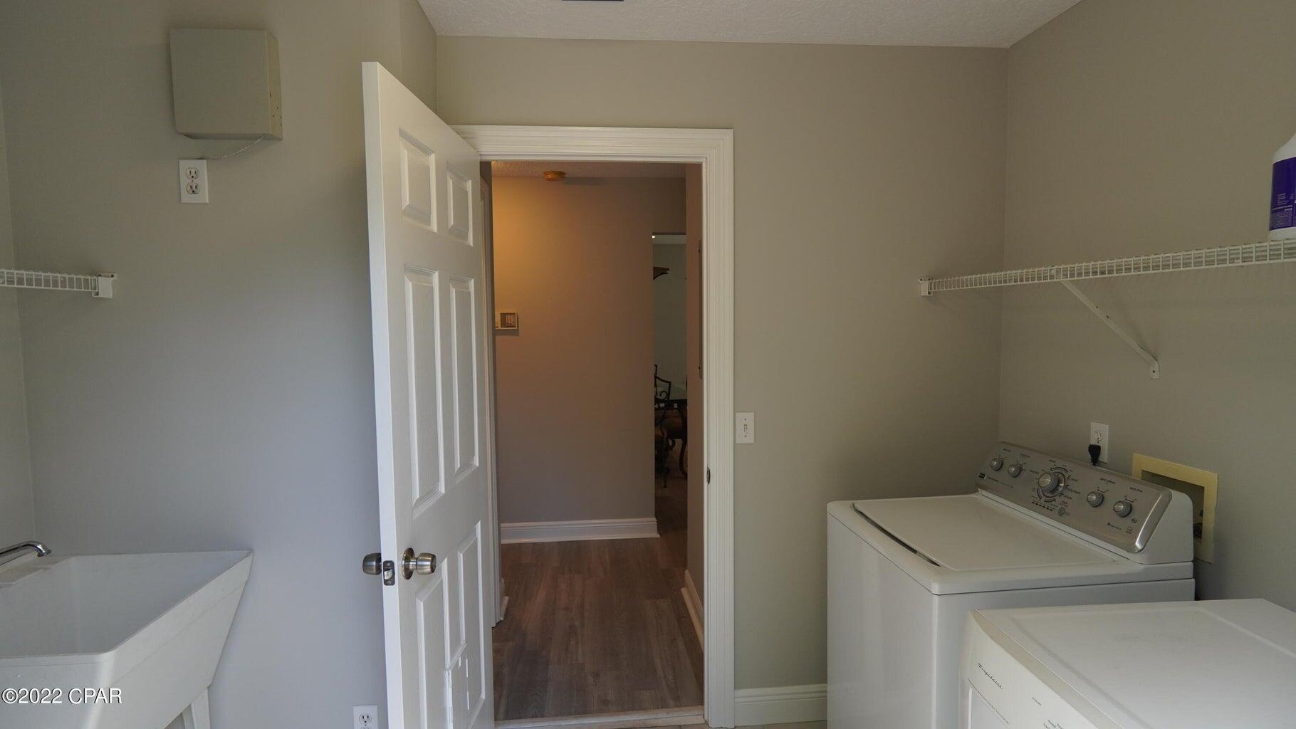 104 Colony Harbour Road Panama City Beach, FL 32407 - Photo 49 of 75 a bathroom with a sink and toilet