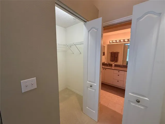 a view of hallway with washer and dryer