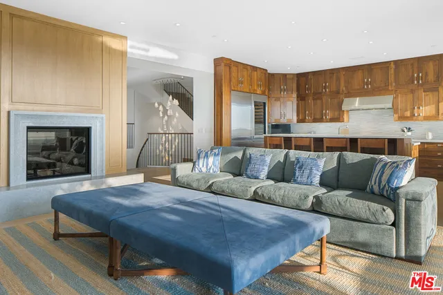 a living room with furniture and window