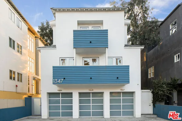 a view of front door of house with a street