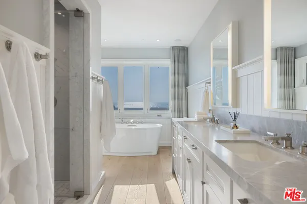 a bedroom with a bed and a fireplace