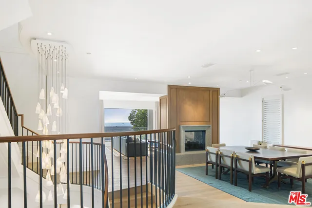 a kitchen with a sink stove top oven and cabinets