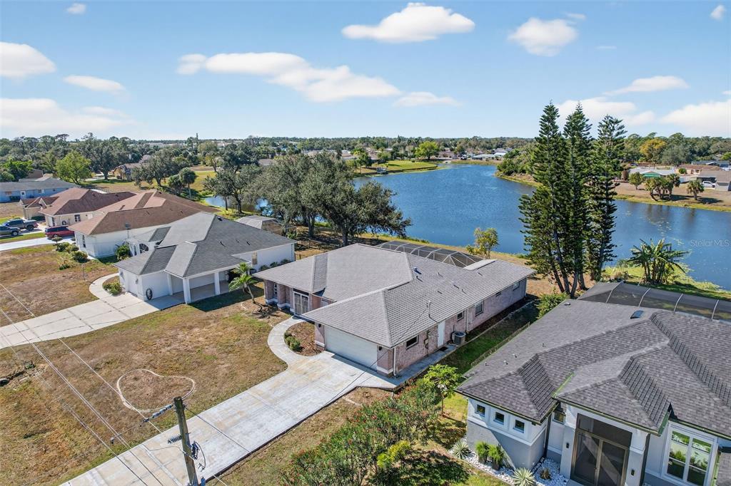 4541 Blueridge Street North Port, FL 34287 - Photo 1 of 52 an aerial view of a house with a garden