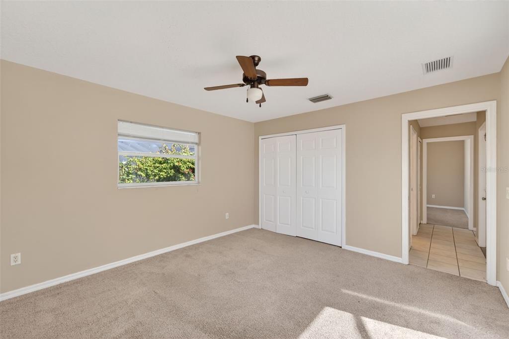 4541 Blueridge Street North Port, FL 34287 - Photo 21 of 52 a view of a chandelier fan and entryway in a room
