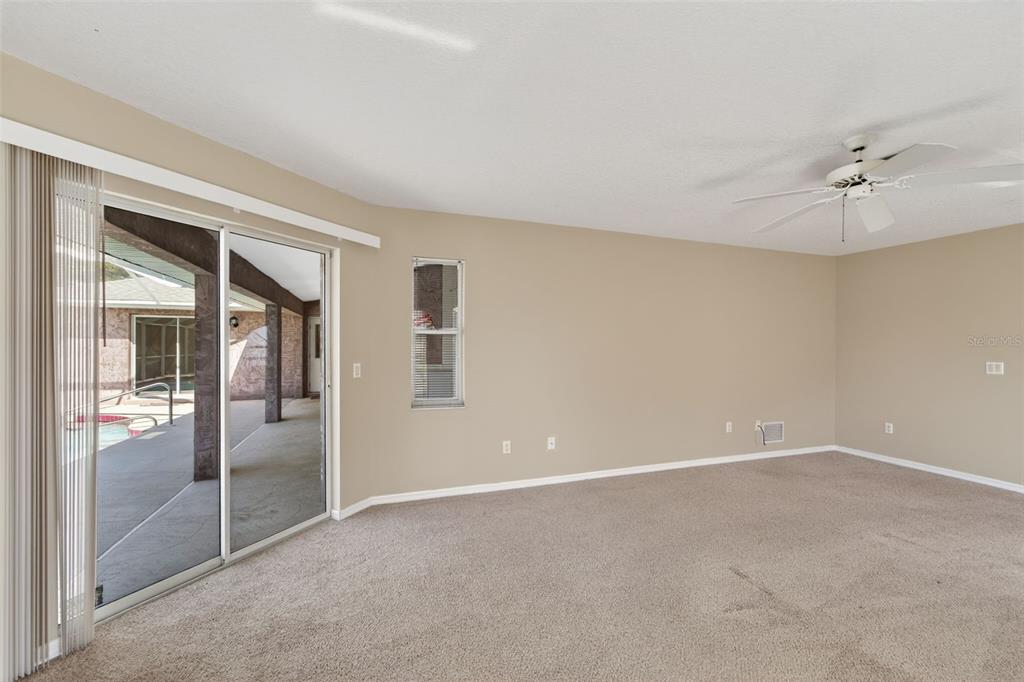 4541 Blueridge Street North Port, FL 34287 - Photo 26 of 52 a view of an empty room with a window