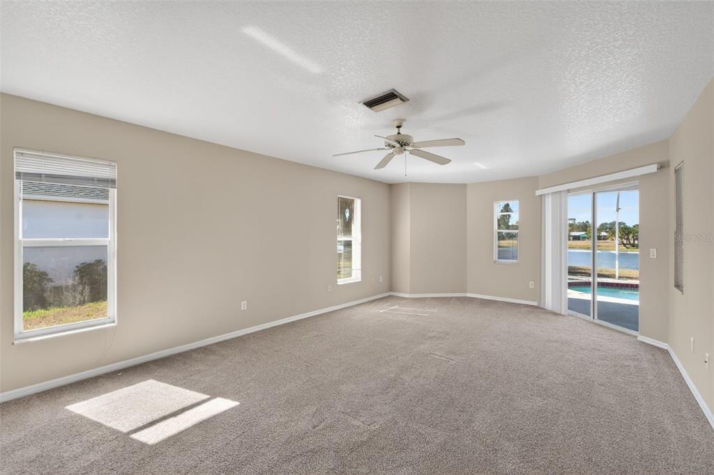 4541 Blueridge Street North Port, FL 34287 - Photo 28 of 52 a view of an empty room with a window