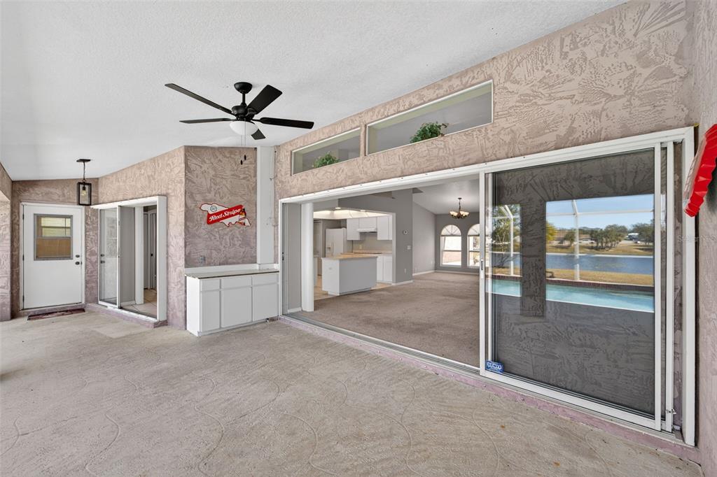 4541 Blueridge Street North Port, FL 34287 - Photo 33 of 52 a view of a hallway with a chandelier