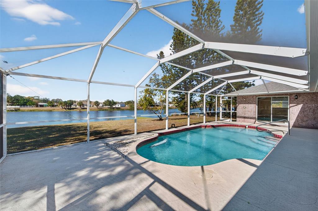 4541 Blueridge Street North Port, FL 34287 - Photo 34 of 52 a view of a house with a backyard porch and sitting area
