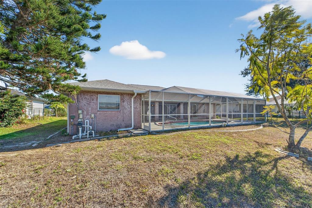 4541 Blueridge Street North Port, FL 34287 - Photo 38 of 52 a view of a house with a yard