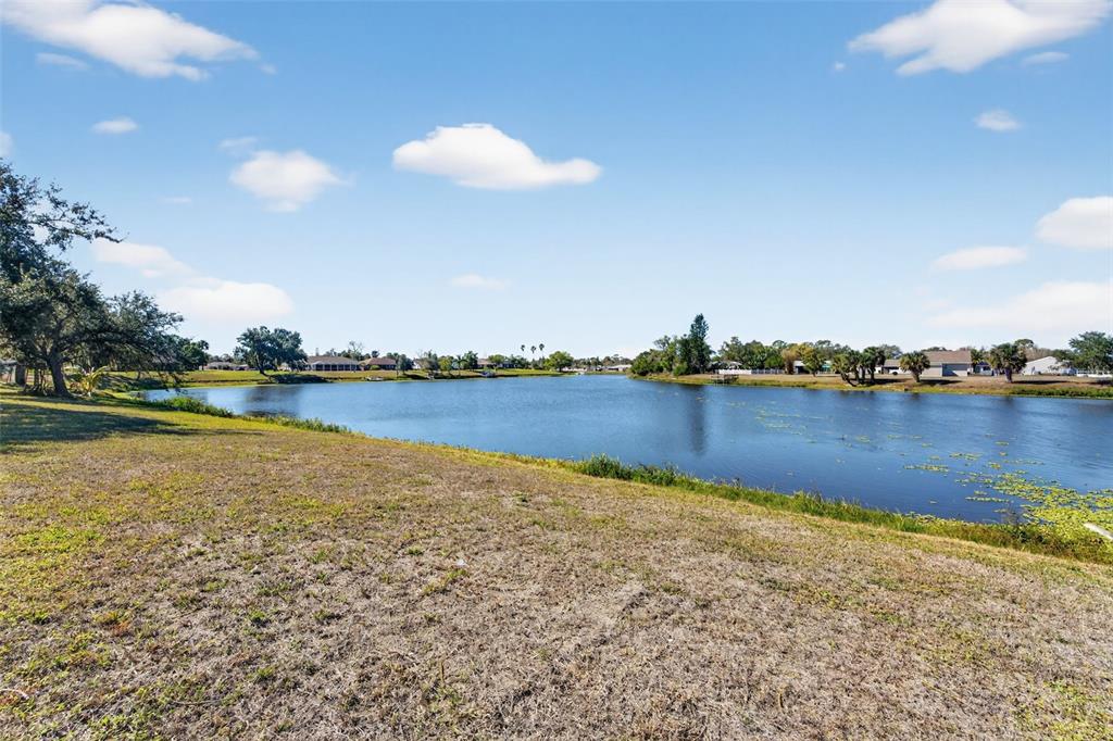 4541 Blueridge Street North Port, FL 34287 - Photo 39 of 52 a view of a lake with houses