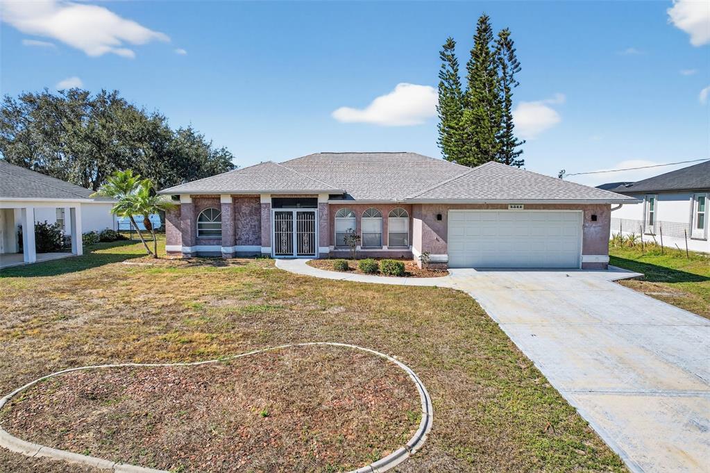 4541 Blueridge Street North Port, FL 34287 - Photo 42 of 52 a house with swimming pool in front of it
