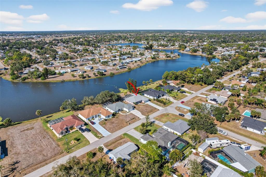 4541 Blueridge Street North Port, FL 34287 - Photo 44 of 52 an aerial view of residential houses with outdoor space