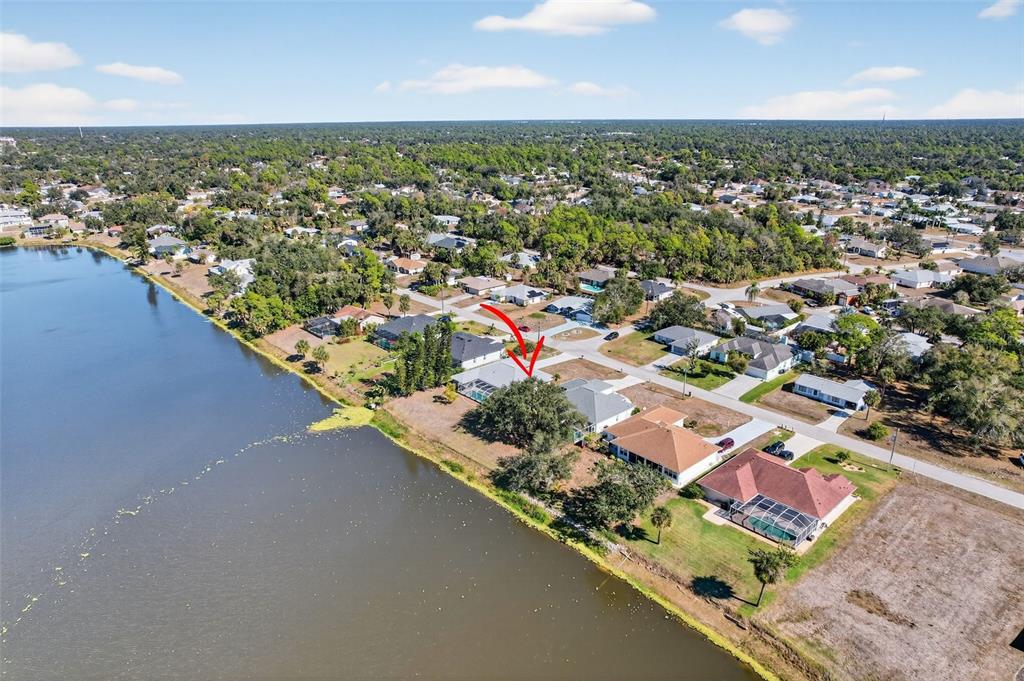 4541 Blueridge Street North Port, FL 34287 - Photo 45 of 52 an aerial view of residential houses with outdoor space and trees