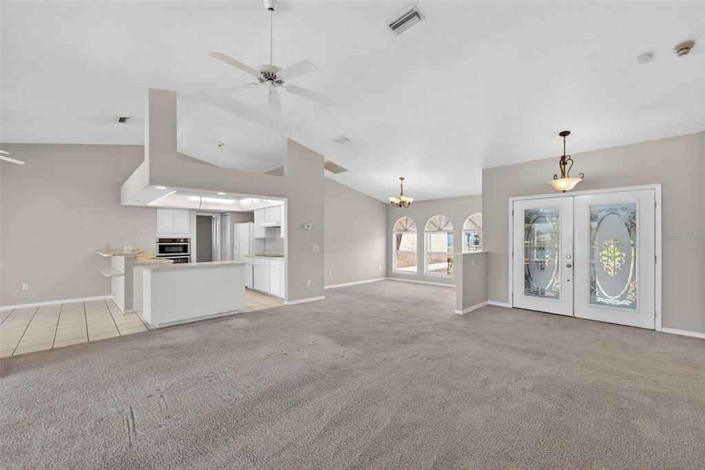 4541 Blueridge Street North Port, FL 34287 - Photo 5 of 52 a view of an empty room with window and cabinet