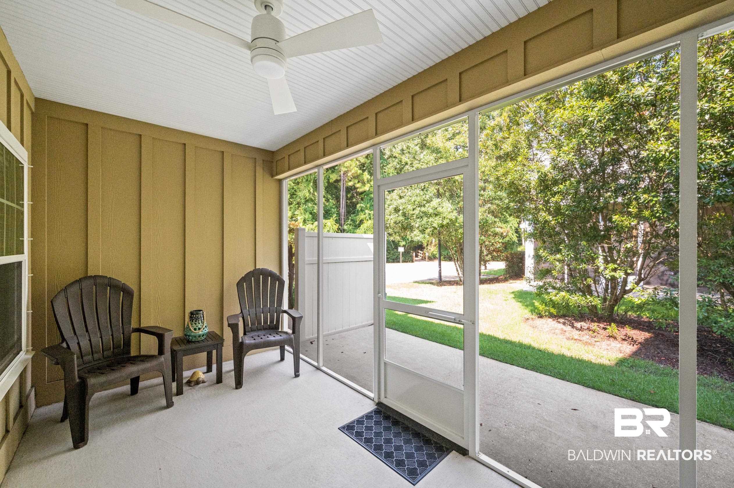430 West Fort Morgan Road, Unit 1902 Gulf Shores, AL 36542 - Photo 38 of 59 Sunroom with a healthy amount of sunlight and ceiling fan