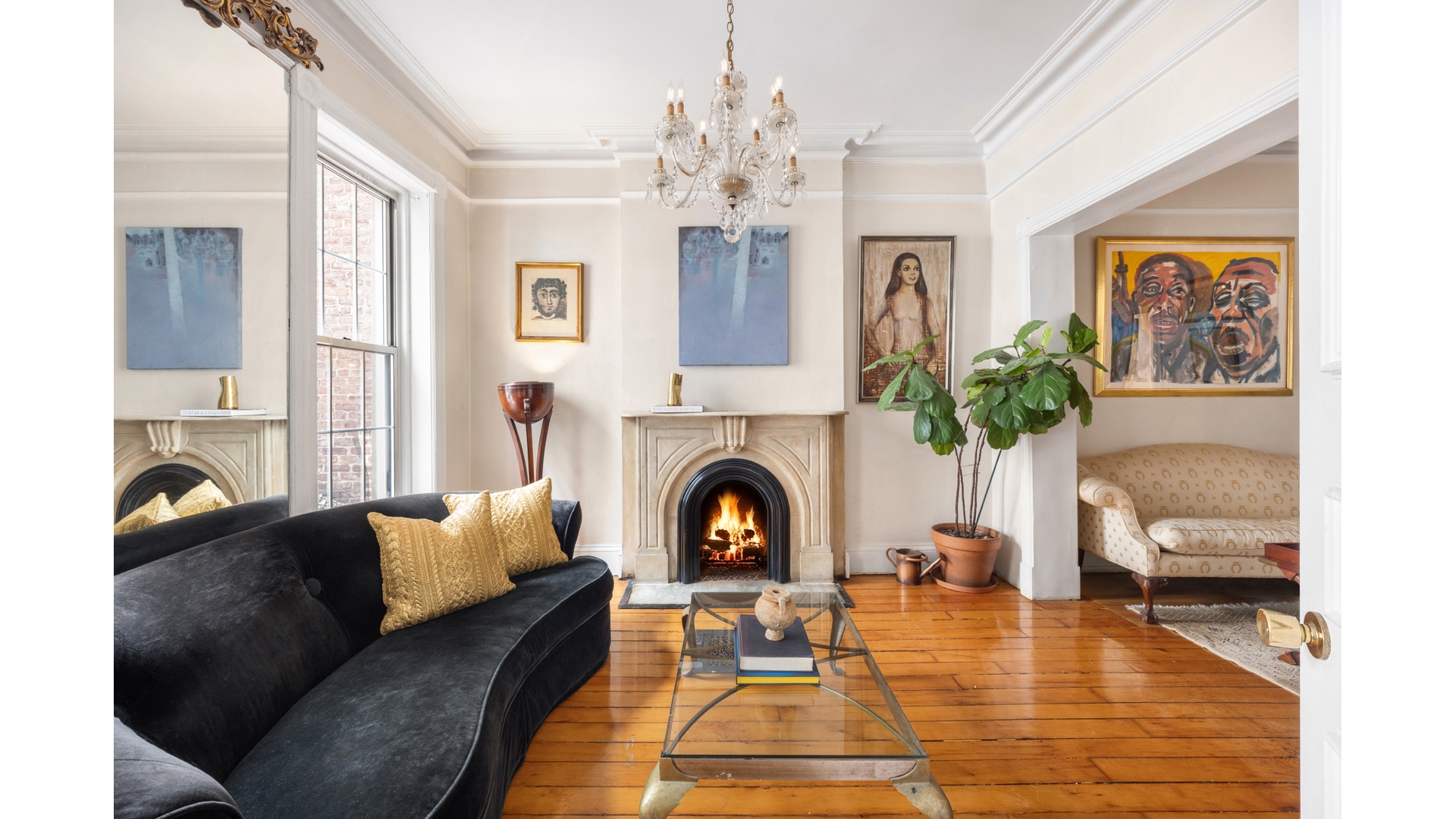 412 East 89th Street Manhattan, NY 10128 - Photo 7 of 25 a living room with furniture and a fireplace