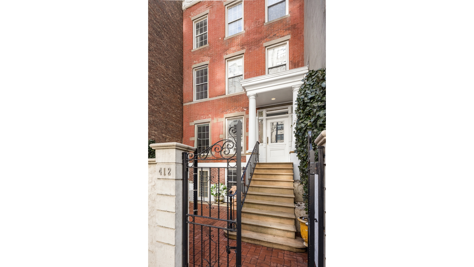 412 East 89th Street Manhattan, NY 10128 - Photo 20 of 25 a view of a hallway with a large window