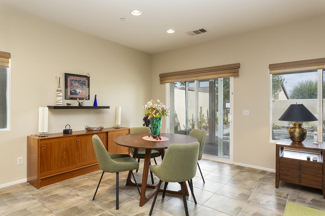 1280 Oro Ridge Palm Springs, CA 92262 - Photo 15 of 46 a dining room with furniture and window