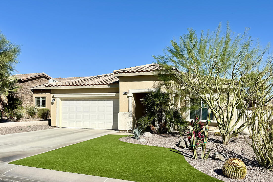 1280 Oro Ridge Palm Springs, CA 92262 - Photo 2 of 46 a view of a house with a yard and porch