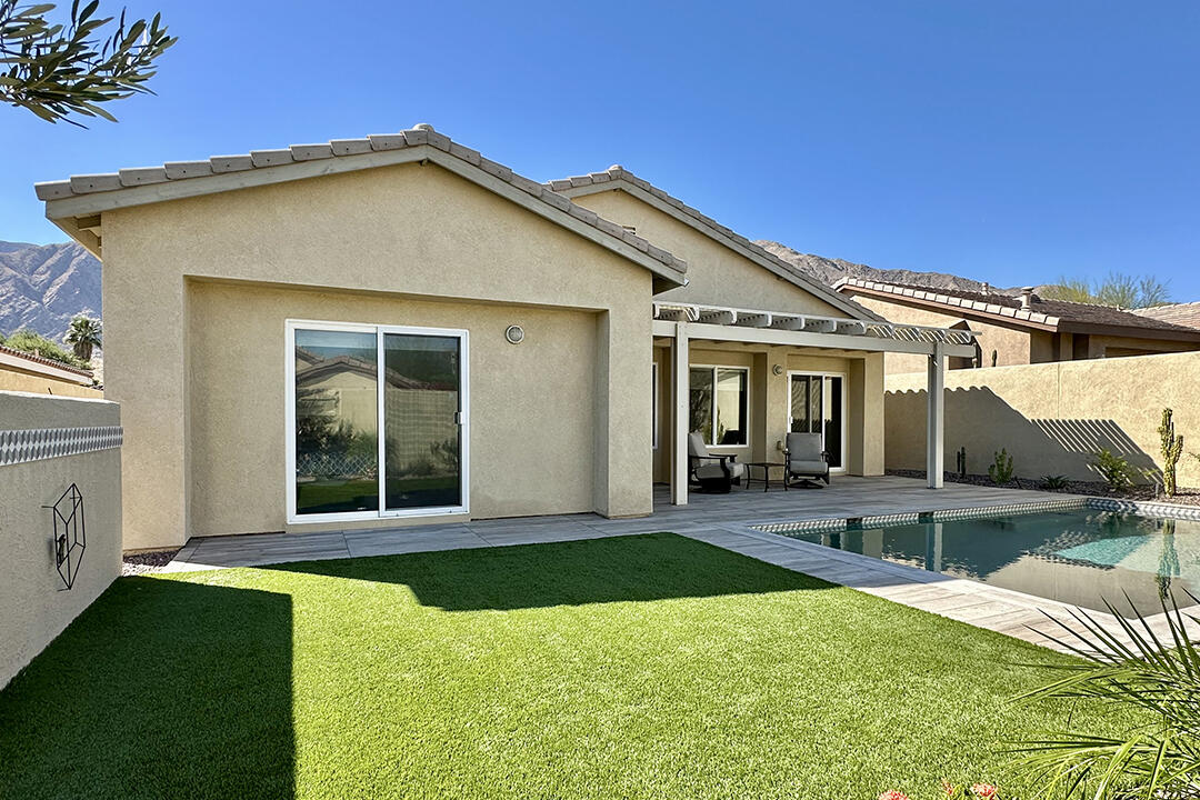 1280 Oro Ridge Palm Springs, CA 92262 - Photo 22 of 46 a view of a house with a yard patio and a patio
