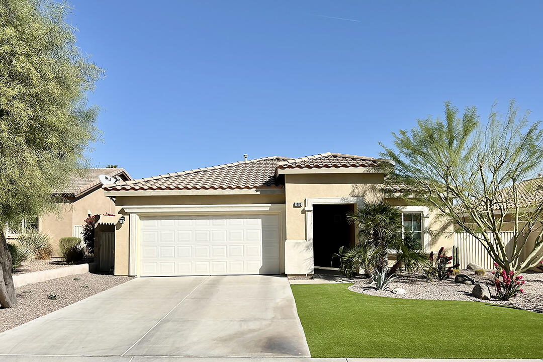 1280 Oro Ridge Palm Springs, CA 92262 - Photo 3 of 46 a view of a house with a yard and potted plants