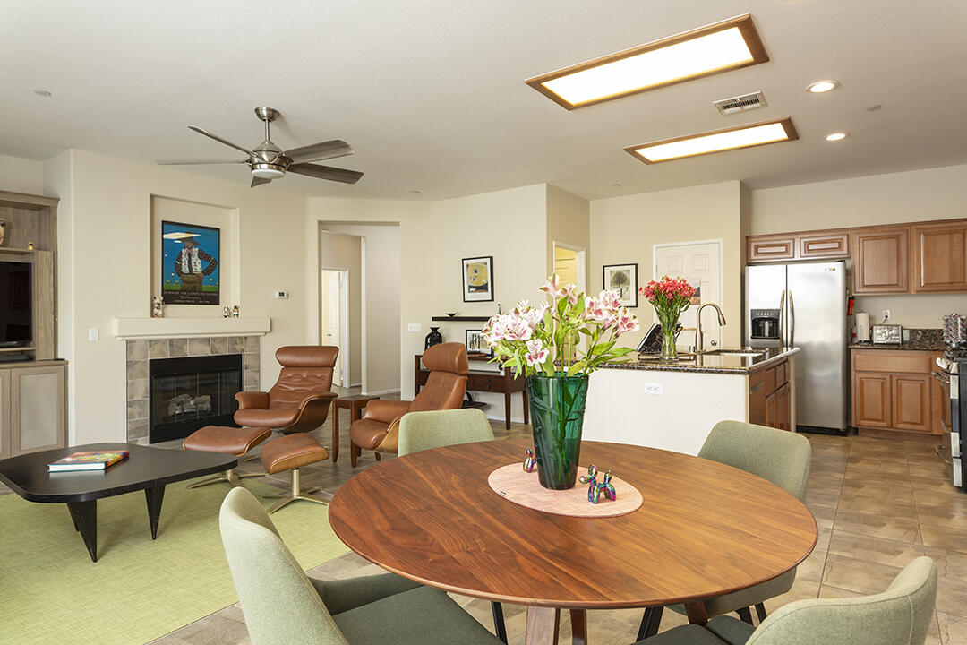 1280 Oro Ridge Palm Springs, CA 92262 - Photo 9 of 46 a view of a dining room with furniture
