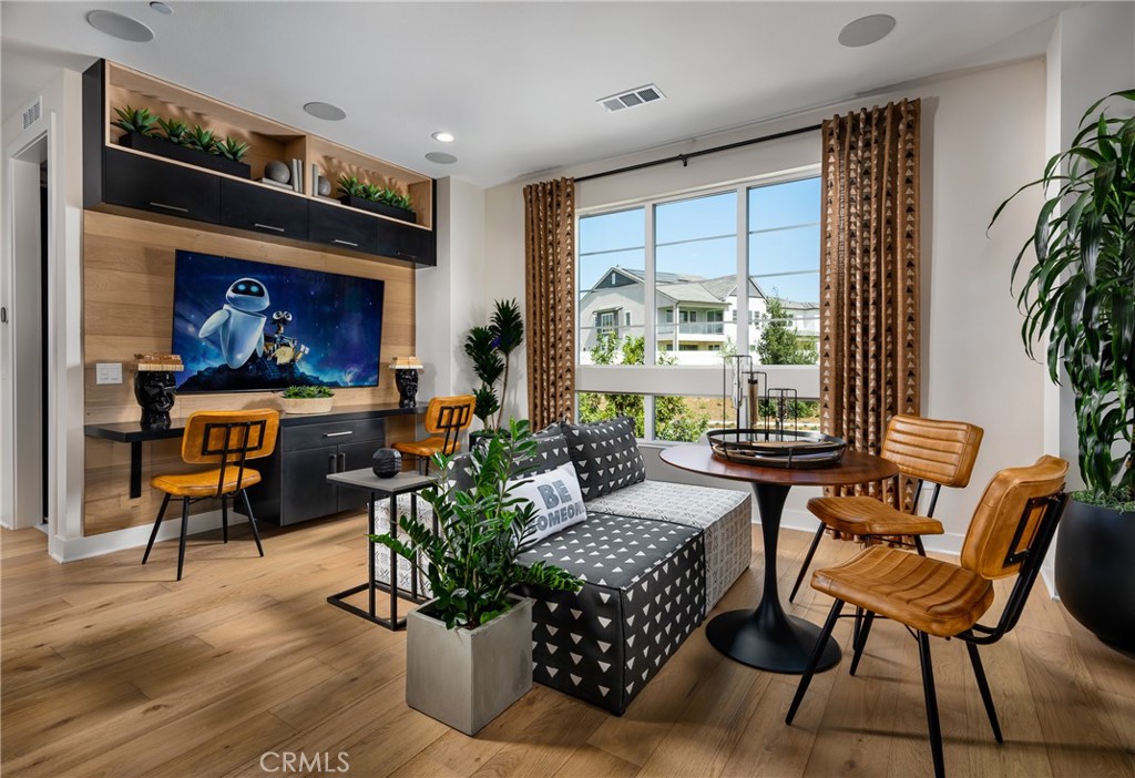 27534 Elderberry Drive Valencia, CA 91381 - Photo 11 of 17 a living room with furniture and a floor to ceiling window