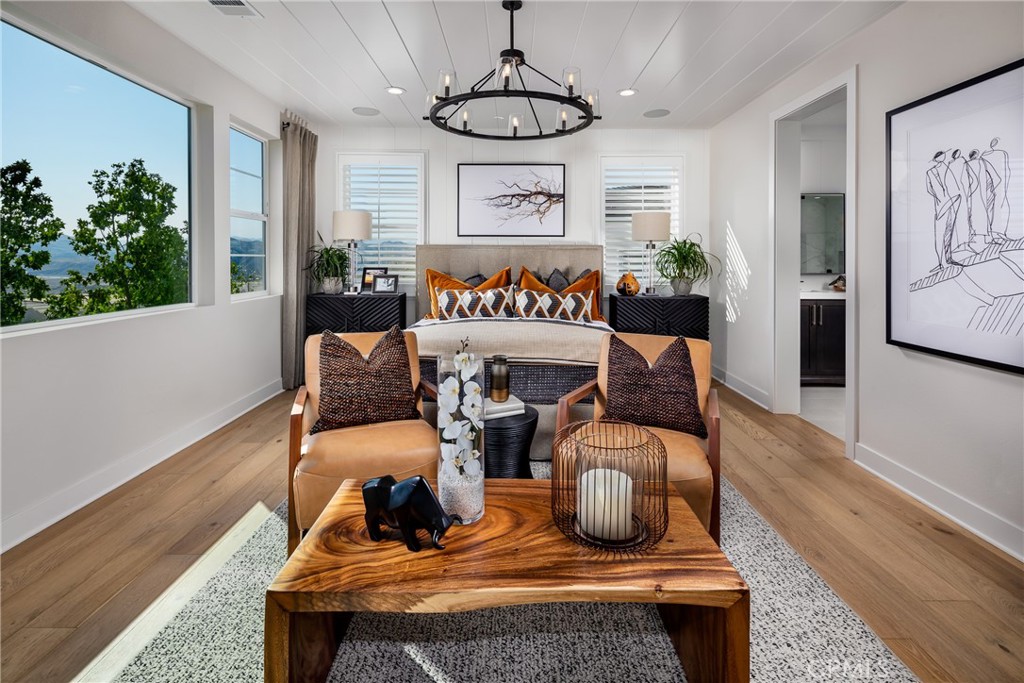 27534 Elderberry Drive Valencia, CA 91381 - Photo 12 of 17 a view of a dining room with furniture window and wooden floor
