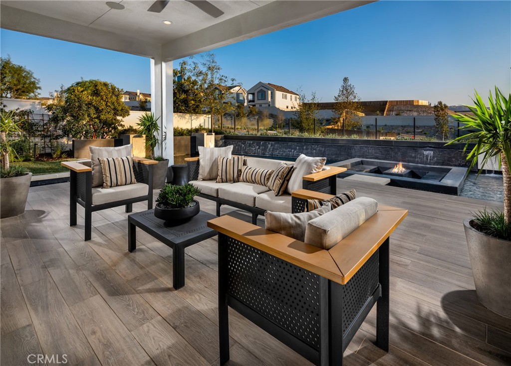 27534 Elderberry Drive Valencia, CA 91381 - Photo 16 of 17 a living room with furniture and a potted plant