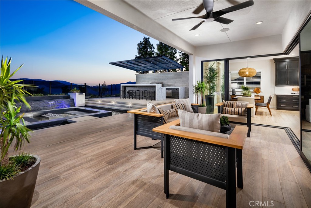 27534 Elderberry Drive Valencia, CA 91381 - Photo 17 of 17 a living room with furniture and a large window